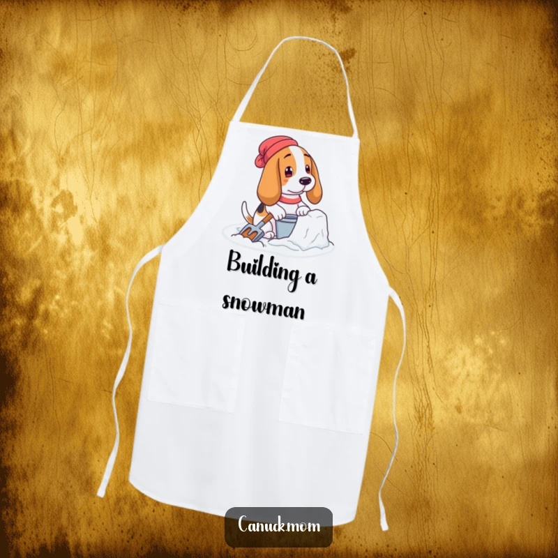 Funny Basset Hound Apron: A dog with pail and shovel building a snow fort, adding humor to cooking.