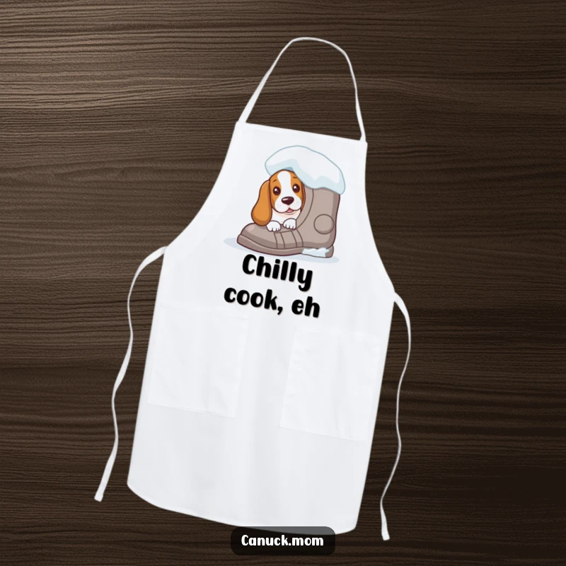 Funny Basset Hound apron with a curious peek from behind a giant snowshoe, adding whimsical winter humor to kitchen activities.