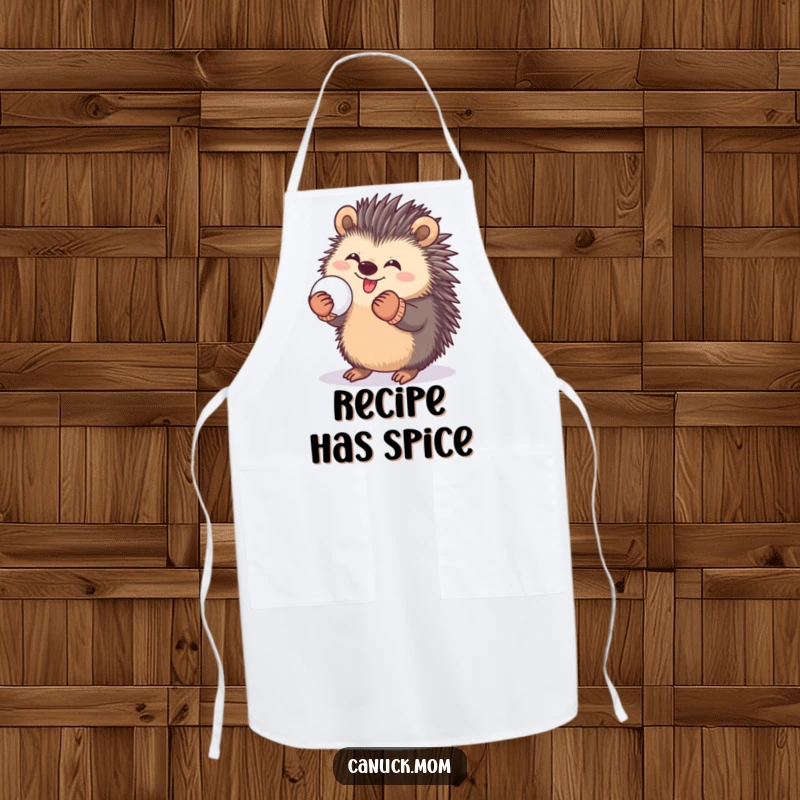 Funny apron showing a happy porcupine in mittens, playfully holding a snowball, bringing kitchen cheer.