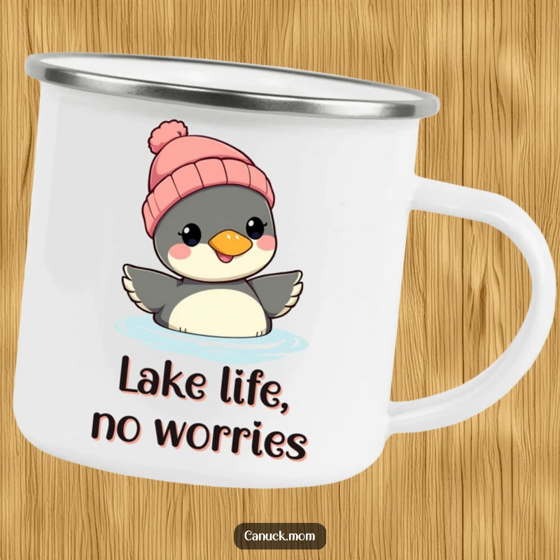 Funny Loon Beanie Camping Mug: A smiling loon with a beanie floats, perfect for enjoying warm drinks during outdoor adventures with a laugh.