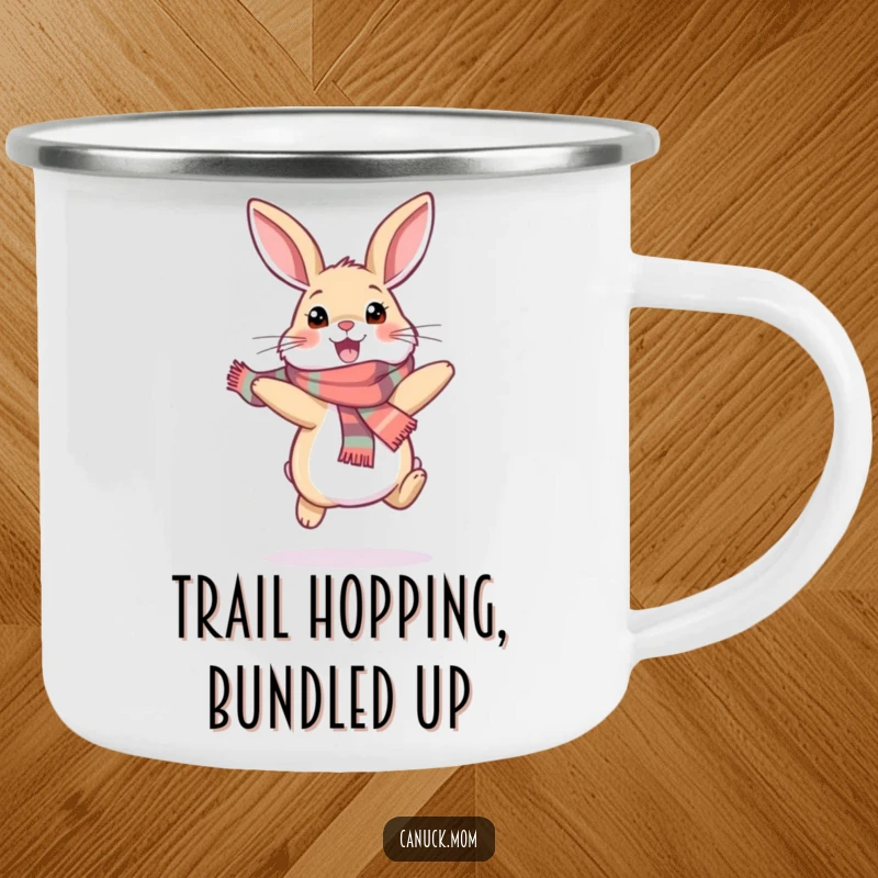 Funny snowshoe hare camping mug with a happy bunny wearing a scarf, hopping excitedly, designed for enjoying drinks outdoors with winter cheer.