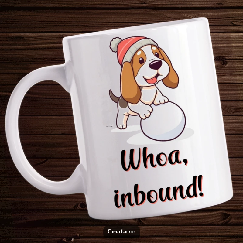 Funny Basset Hound Mug: A dog in a warm cap trips over a rolling snowball with a comical expression.