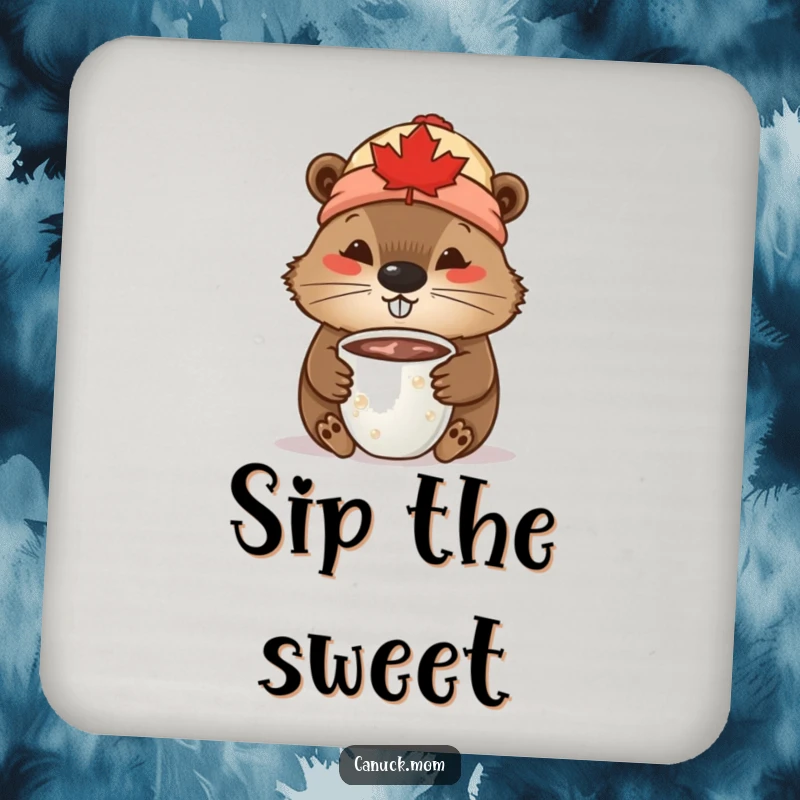 Funny Beaver Coaster: A beaver wearing a maple leaf toque is depicted sipping hot chocolate.