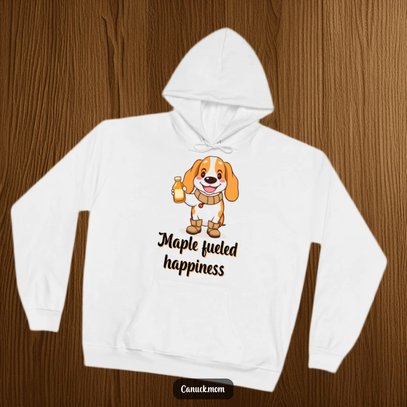 Funny Basset Hound Hoodie: A happy dog wearing boots holds a tiny maple syrup bottle, ready to pour.