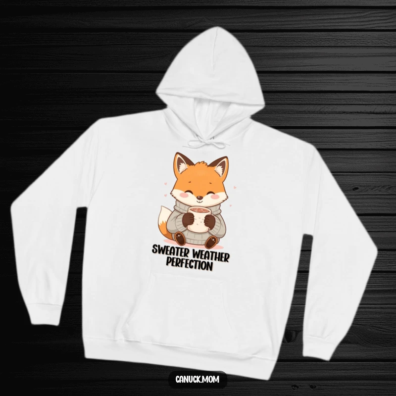 Funny Fox Cocoa Hoodie: A smiling fox in a cozy sweater sips hot cocoa; plush and humorous winter apparel.