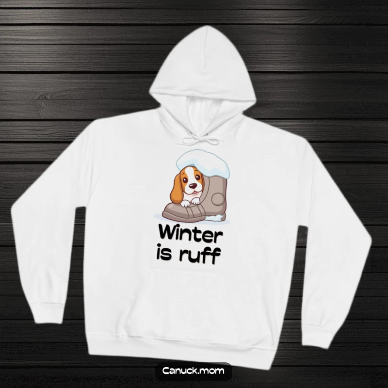 Funny Basset Hound hoodie with a curious peek from behind a giant snowshoe, providing warmth and wintery humor for outdoor enthusiasts.