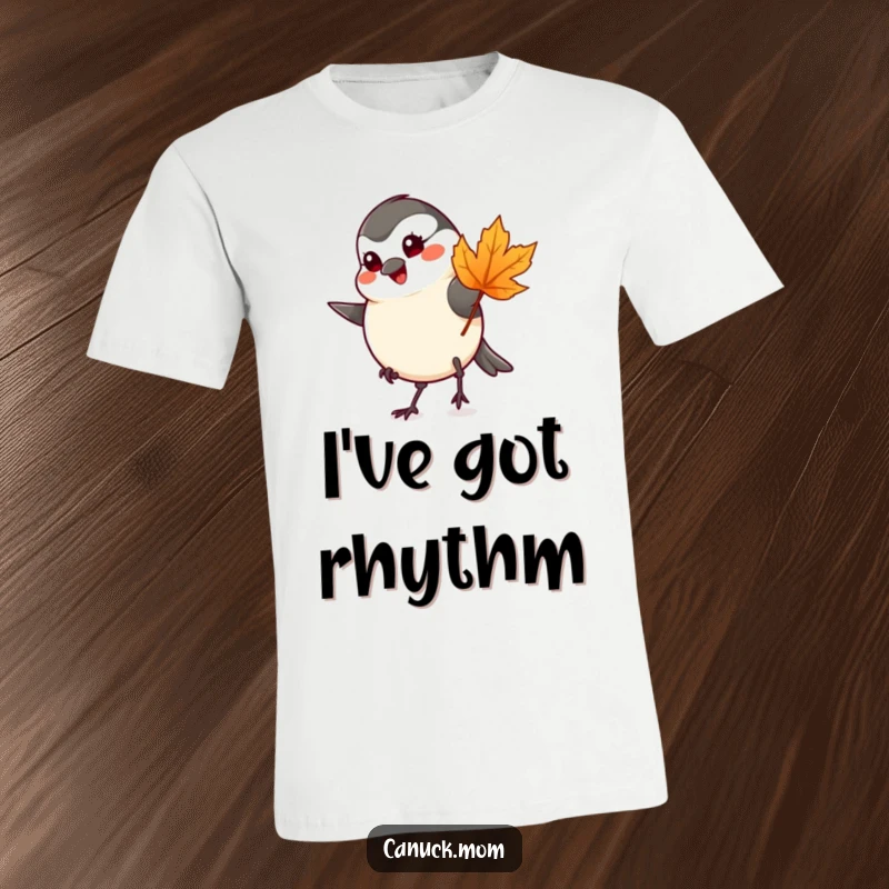Funny cheerful chickadee tapping foot with a maple leaf on a t-shirt, celebrating autumn vibes.