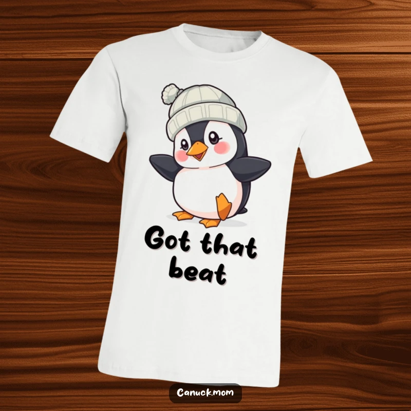 Funny Puffin Hat T-Shirt: A cheerful puffin wearing a knit hat taps its foot rhythmically, showcasing a playful and humorous attitude.