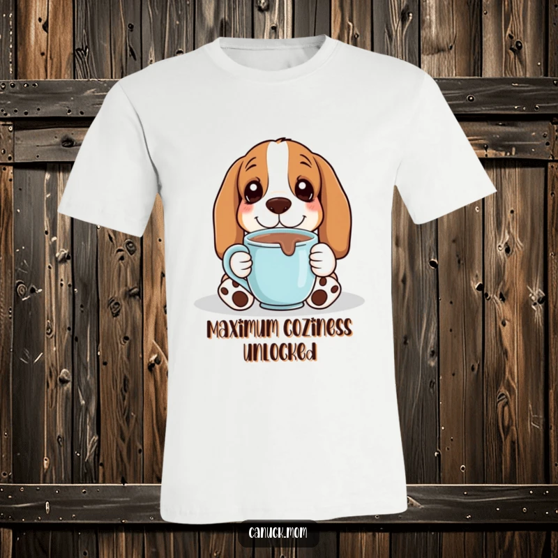 A content Basset Hound happily sipping hot chocolate from a mug is featured on this cozy t-shirt.