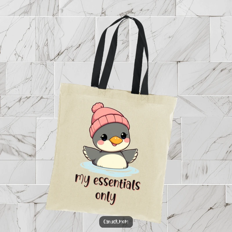 Funny Loon Beanie Tote Bag: A smiling loon with a cozy beanie floats, perfect for carrying items with a touch of whimsical humor.